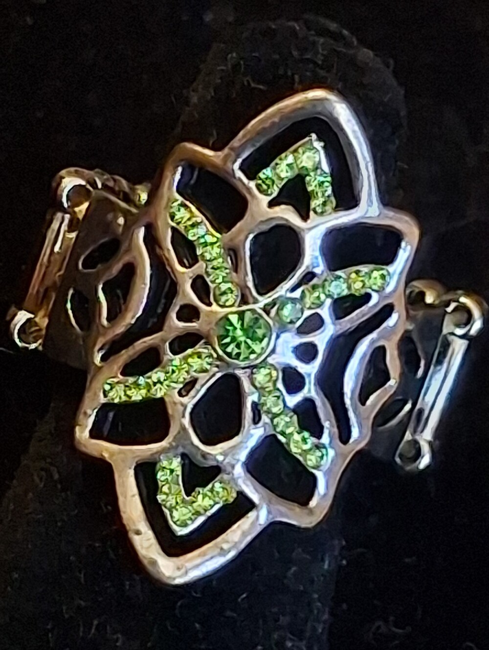 Paparazzi Silvertone Floral Cutout Stretch Ring with Green Crystal Accents